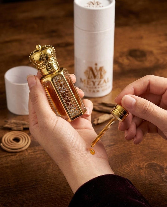 Meyzal Sultan Oud crown-cap attar perfume oil with its package